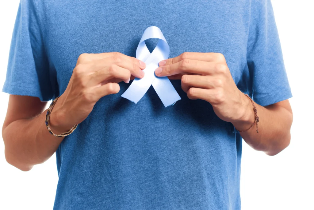 man holding health awareness ribbon